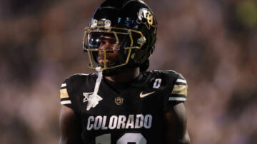 Football player in Colorado uniform on field, Tavis, #tik4tat