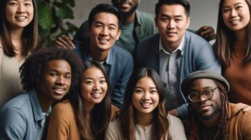 Diverse group smiling with a tablet, indoors. @tik4tat